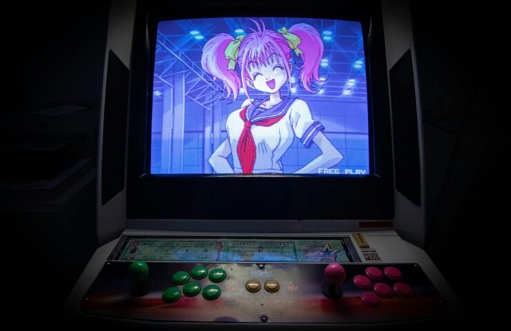 black flat screen tv turned on showing woman in blue dress